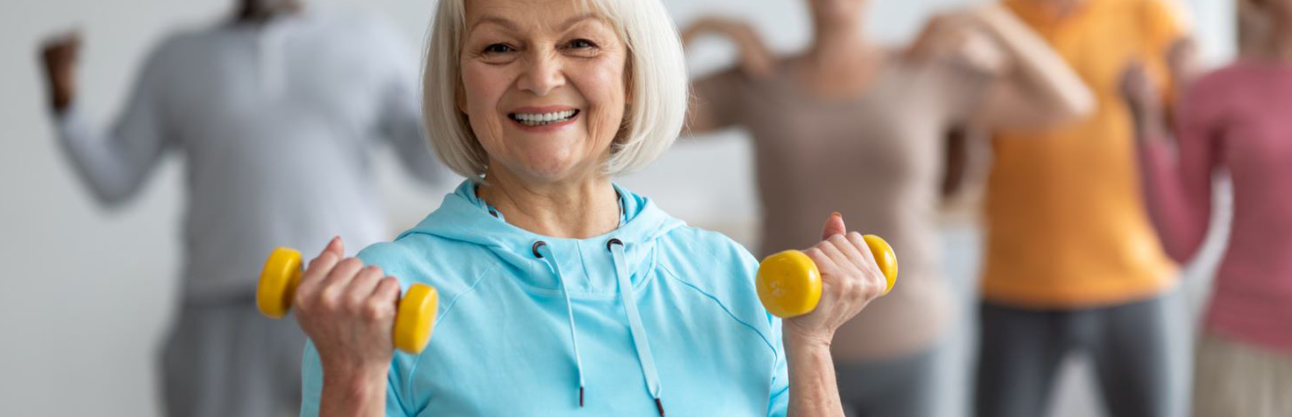 A group of older people enjoying gentle exercises.